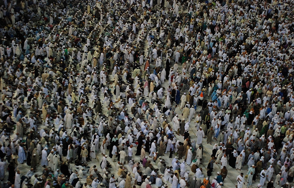 Persons crowd meeting