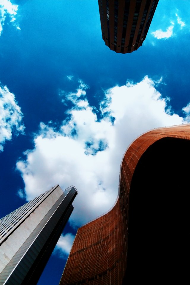 Brown And White Concrete Buildings Under Blue Sky Photography photo