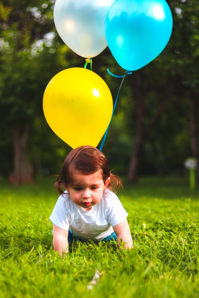 Photography Of A Baby On Grass