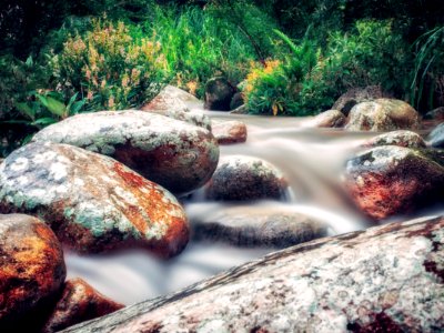 Time Lapse Photo Of River Flowing On Rocks