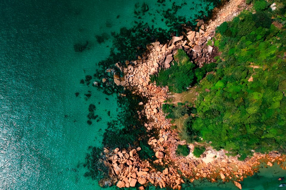 Birds Eye Photography Of Ocean And Mountains