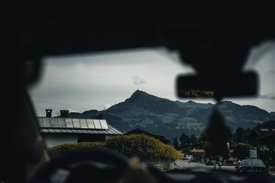 Person Sitting On Car Seat Viewing Mountain