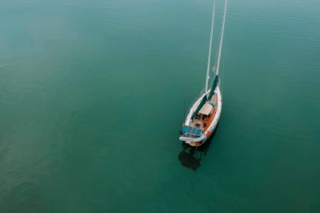 Aerial Photography Of Boat On Body Of Water photo