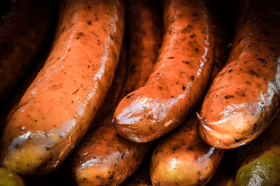 Sausages grill burning