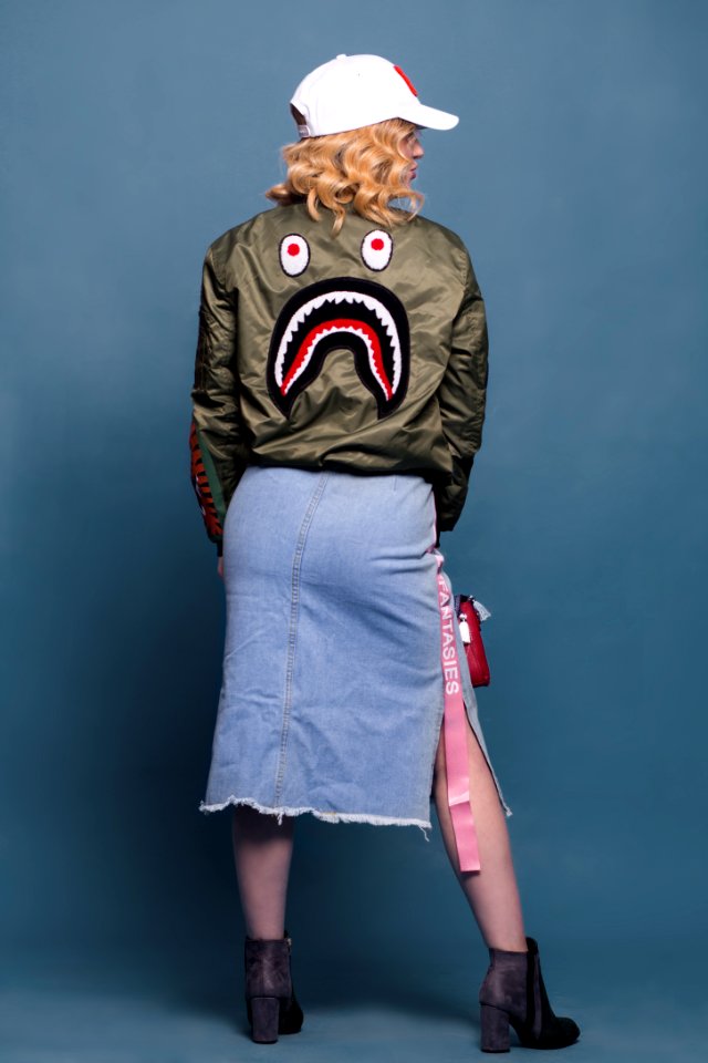 Woman Wearing Green Bathing Ape Jacket And Bottom Skirt