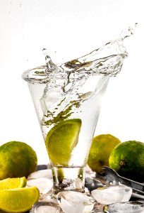 Water Filled Glass Cup With Sliced Lime photo