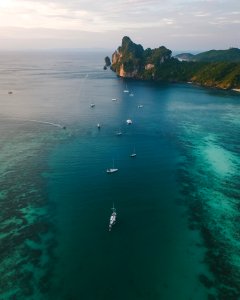 Body Of Water And Green Mountains photo