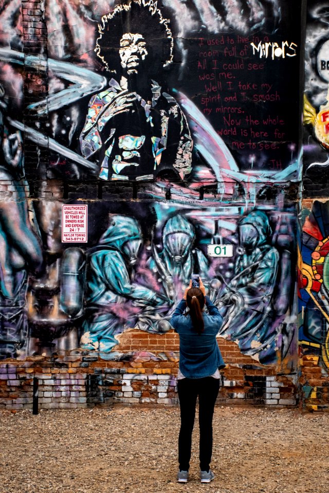 Photography Of A Woman Taking Picture