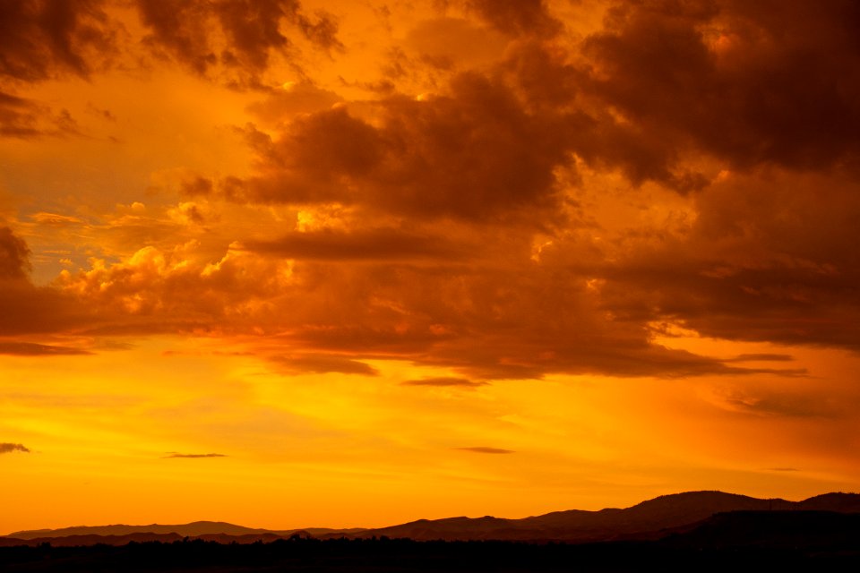 Sunset Under Cloudy Sky