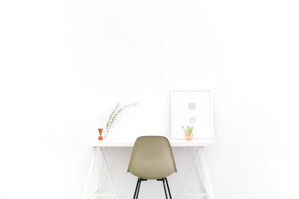 Beige And Black Chair In Front Of White Desk