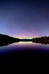 Blue Sea Under The Clear Sky During Night Time photo