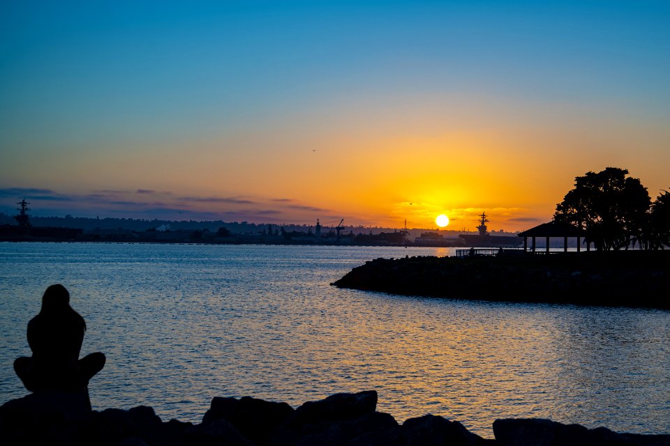 Silhouette Photography Of Person During Dawn photo