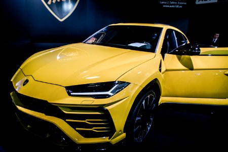 Yellow Luxury Car Near Man