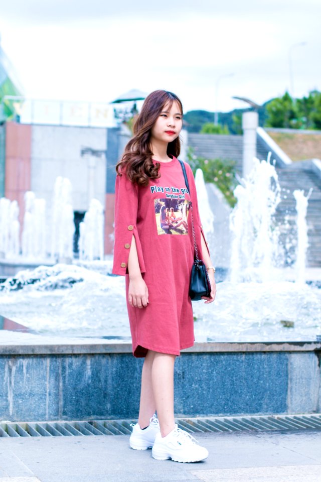 Woman Wearing Pink Dress Standing Near Water Fountain