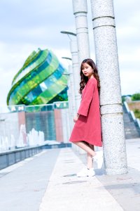 Woman Wearing Red Long-sleeved Dress photo