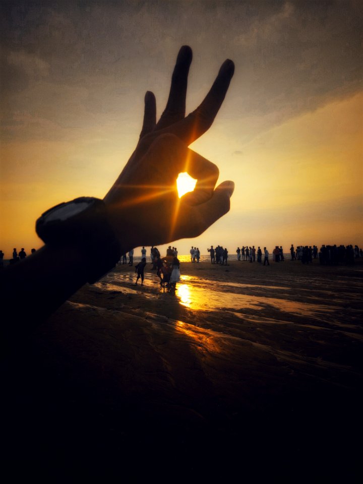 Silhouette Photography Of People Near Body Of Water