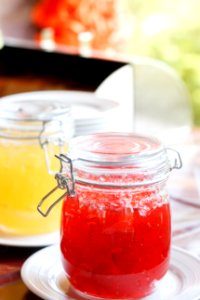 Jar With Red Jam On White Sauer photo