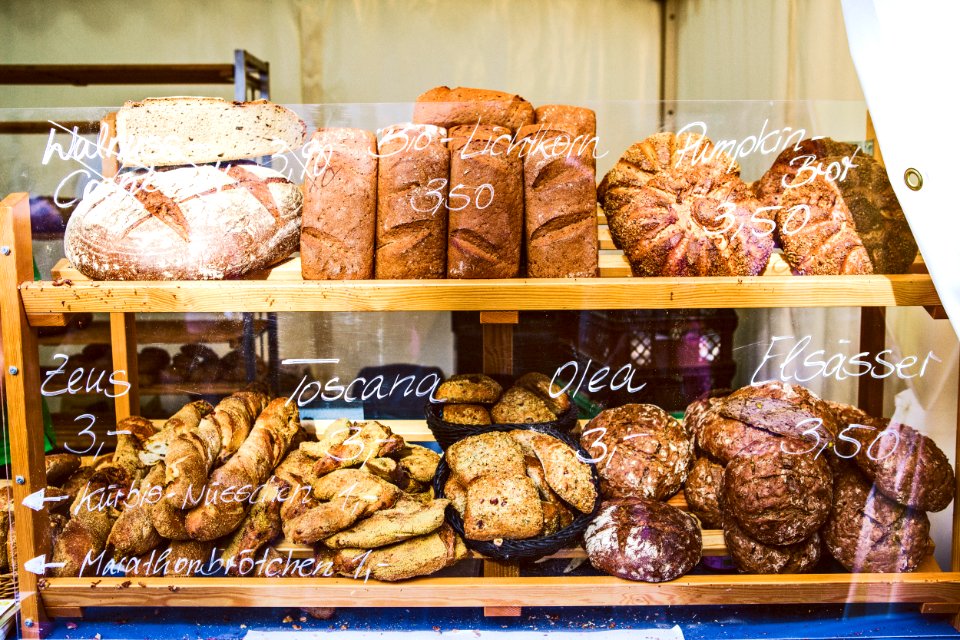 Brown Wooden Rack With Baked Bread Displayed photo