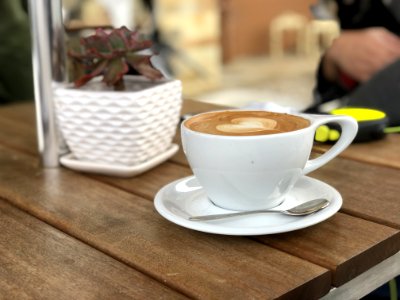 White Ceramic Coffee Mug With Saucer And Teaspoon photo