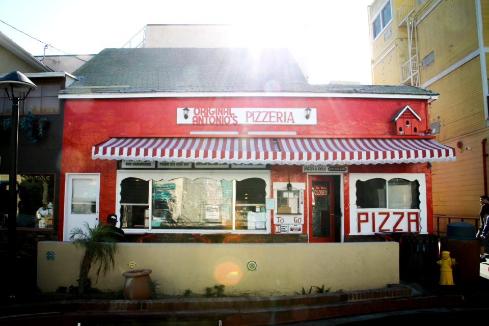 Red And White Pizzeria Cafe At Daytime