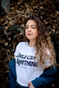 Shallow Focus Photography Of Woman In White T-shirt And Blue Jacket