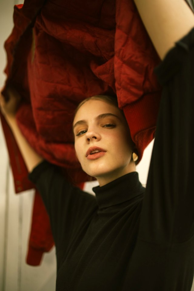 Photo Of Woman Wearing Black Turtleneck Top