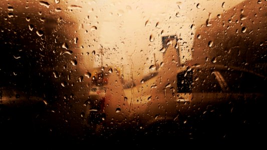 Vehicle Glass Window With Water Droplets photo