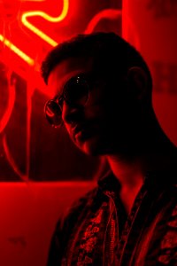 Man In A Red-lit Room photo