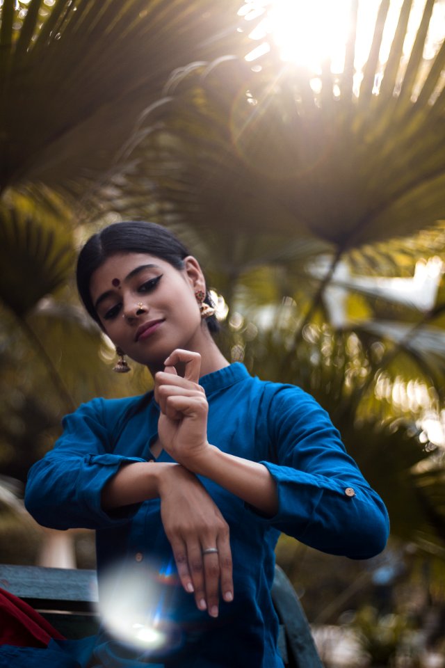 Woman Wearing Blue Long-sleeved Top