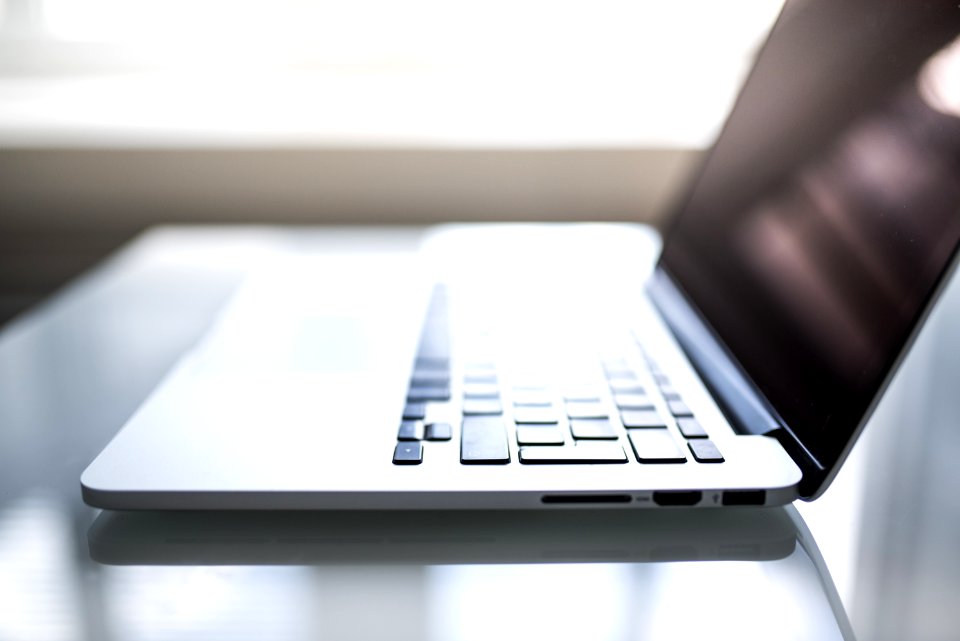 Shallow Focus Photography Of Macbook