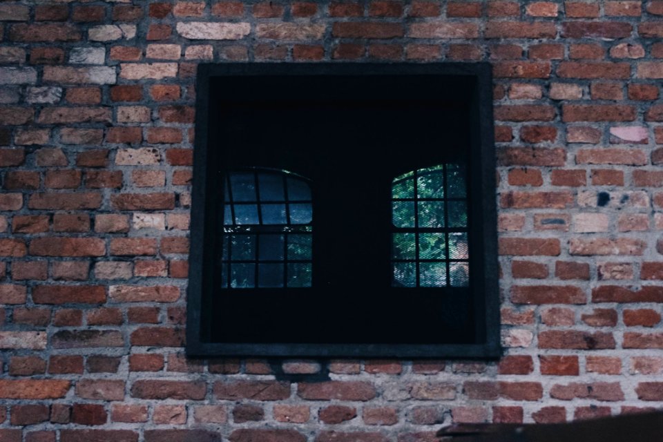 Square Black Window On Concrete Wall