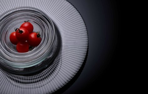 Five Tomatoes On Clear Glass Bowls photo