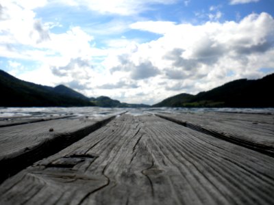 Board In Front Of Mountains
