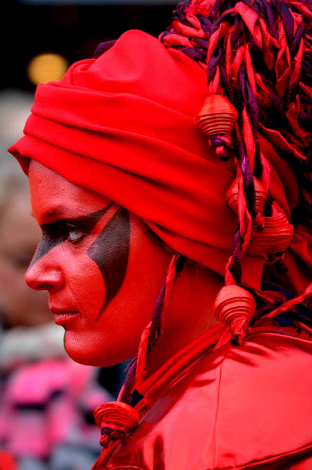Woman Wearing Red And Purple Head Wrap
