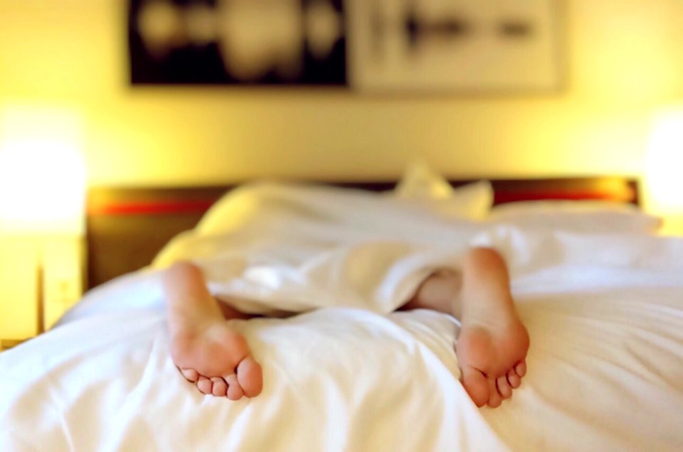 Collapsed On The Bed