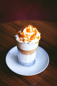 White And Brown Caramel Frappe On Clear Drinking Glass photo