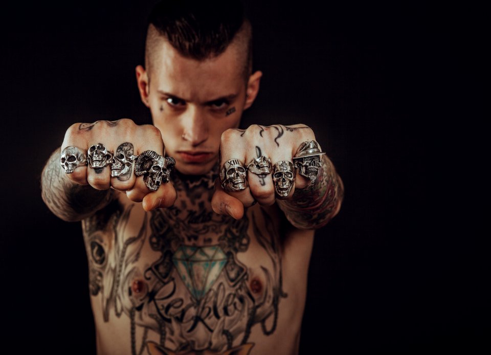 Man Wearing Silver Skull Ring