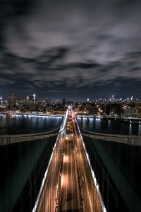 Bridge Under Grey Cloudy Ski During Night Time photo