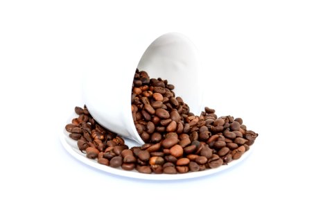 Coffee Beans On White Ceramic Saucer photo