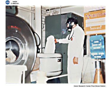 Technician Washes Clothing