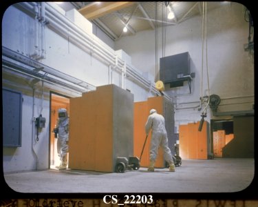 Technicians With Cutie Pie Radiation Detector