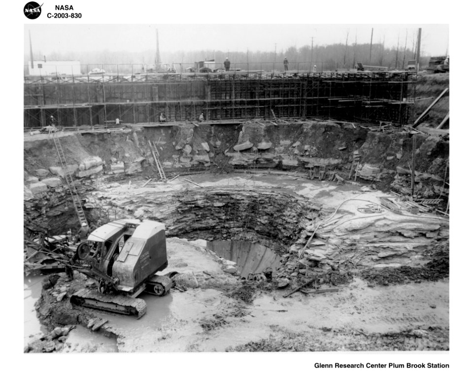 Crews Excavate A Hole In The Ground