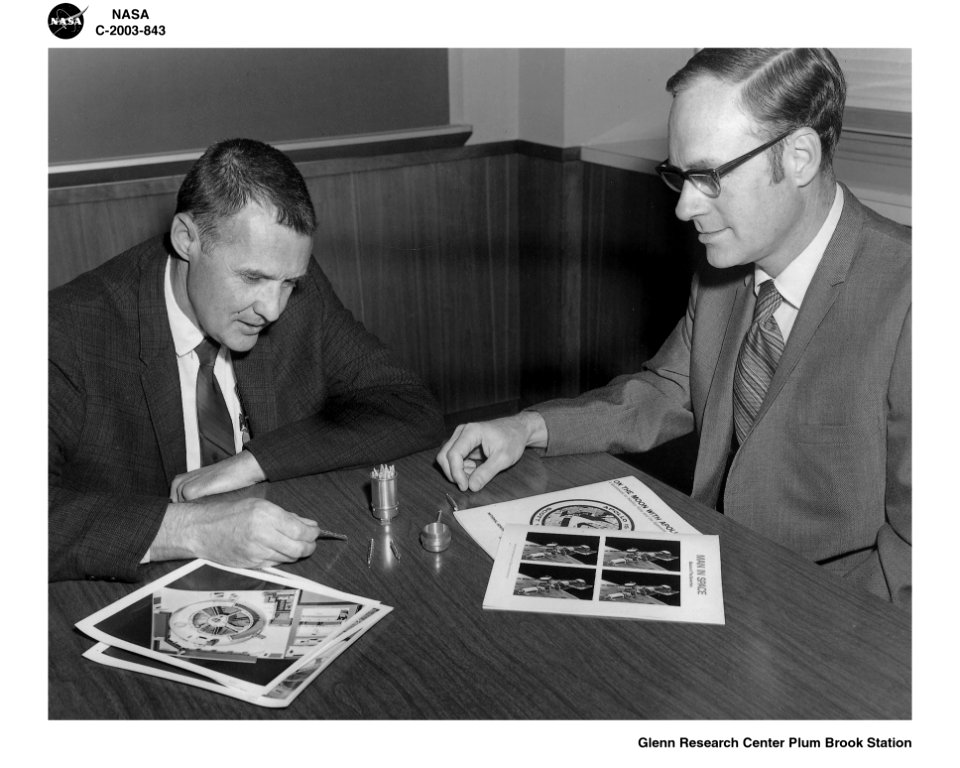 Hap Johnson And H Brock Barkley Examine Aluminum Rabbit