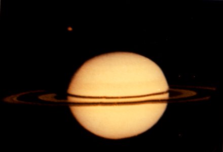 Pioneer 11 Image Of Saturn And Its Moon Titan