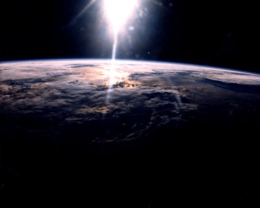 Sunlight Over Earth As Seen By STS-29 Crew