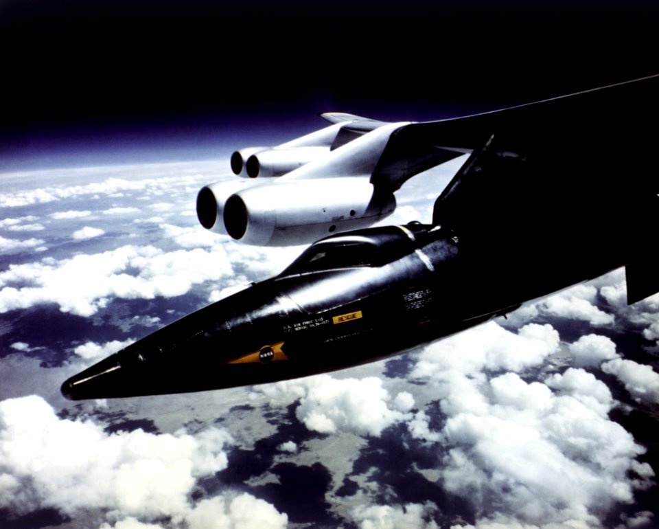 X-15 Mounted To B-52 Mothership Pylon In Flight