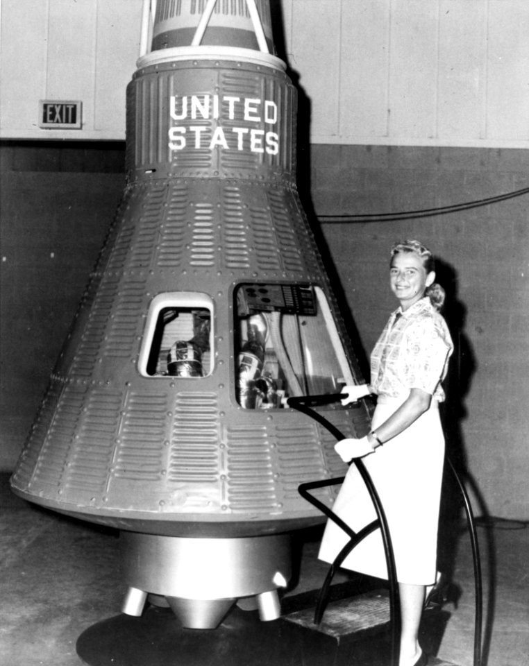 Jerrie Cobb Poses Beside Mercury Capsule