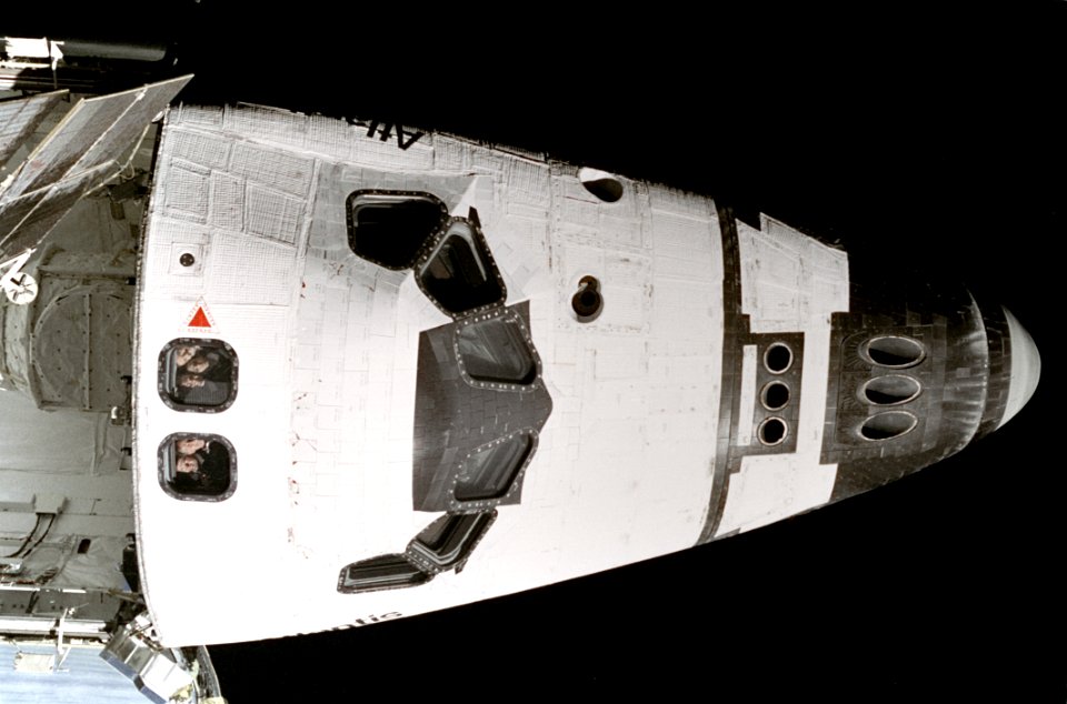 Crewmembers Peer At Mir