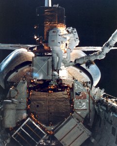 STS-41C Astronauts Repair The SMMS photo