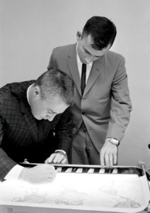 Grissom And Young Examine Gemini III Photos